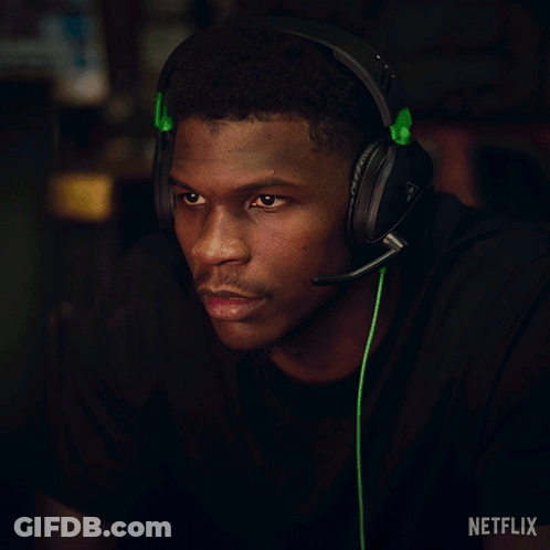 Man Wearing Headphones With Green Cord And Netflix Logo GIF