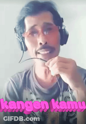 Man Wearing Headphones With Kangen Kamu In Pink Letters GIF