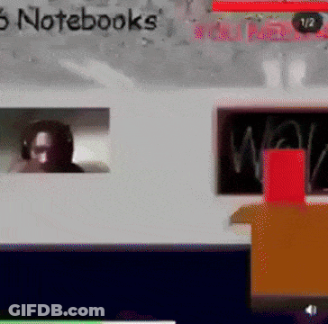 Man Wearing Headphones With Notebooks On Screen GIF