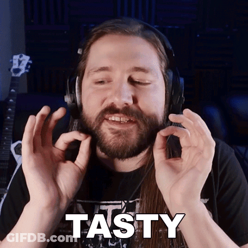 Man Wearing Headphones With Tasty Face GIF