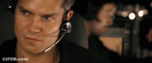 Man Wearing Headset Looking GIF