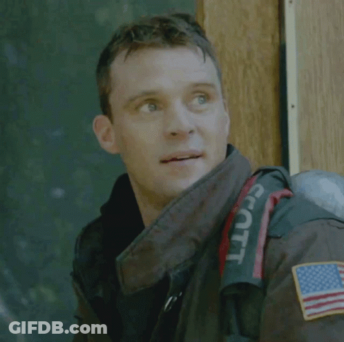 Man Wearing Jacket That Says Scott GIF
