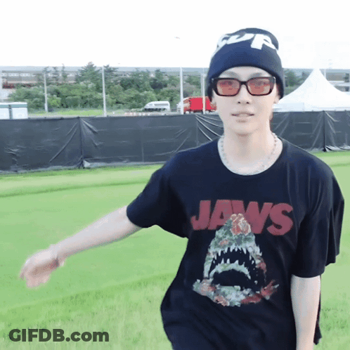 Man Wearing Jaws T-Shirt And Beanie GIF