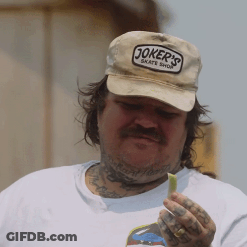 Man Wearing Joker's Skate Shop Hat GIF