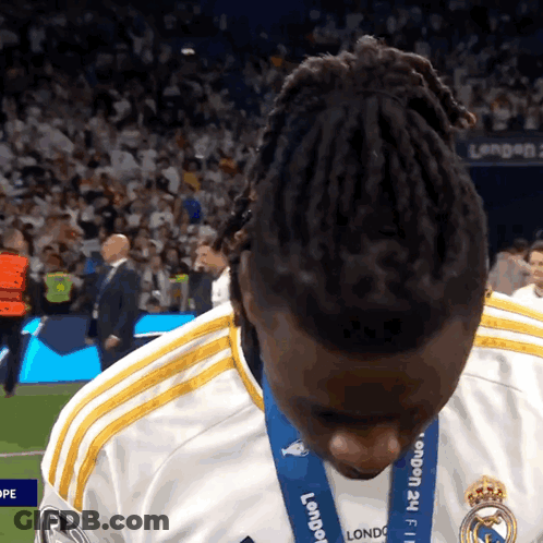 Man Wearing London 2012 Medal GIF
