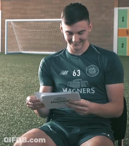 Man Wearing Magners Shirt Reading Book GIF