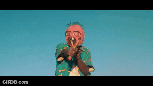 Man Wearing Mask And Glasses Holding Gun GIF