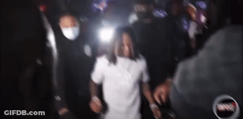Man Wearing Mask Dancing In Crowd GIF