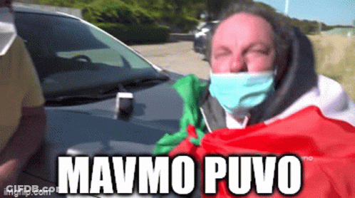 Man Wearing Mask Saying Mavmo Puvo GIF