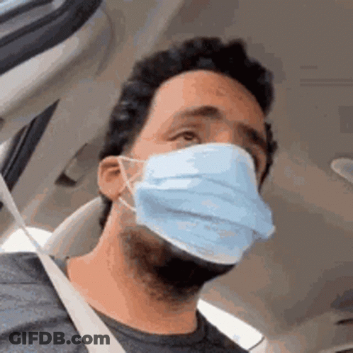 Man Wearing Mask Sitting In Car GIF