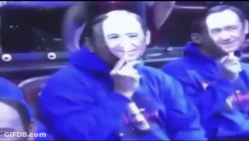 Man Wearing Mask Sitting In Stadium GIF