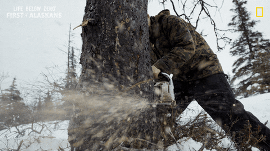 Man Wearing Navy Jacket Strongly Hold Saw GIF