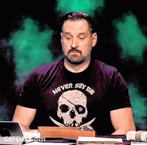 Man Wearing Never Say Die T-Shirt GIF