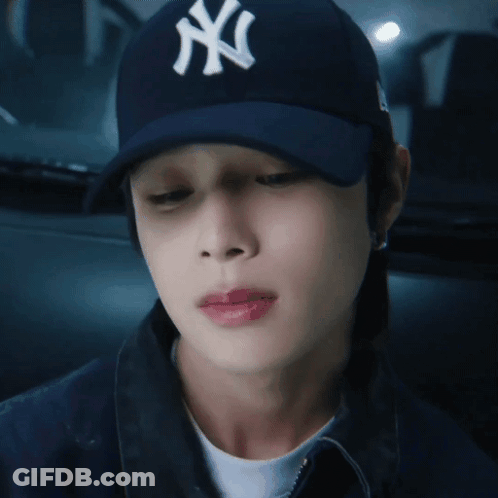 Man Wearing New York Yankees Hat Looking Down GIF