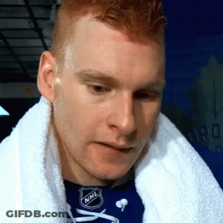 Man Wearing NHL Shirt And Towel GIF
