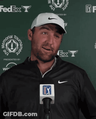 Man Wearing Nike Hat In Front Of FedEx GIF