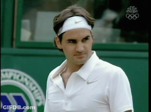 Man Wearing Nike Headband In Front Of NBC Sign GIF