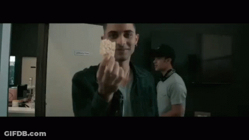 Man Wearing Nirvana Hat GIF