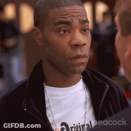 Man Wearing Original Peacock Necklace GIF