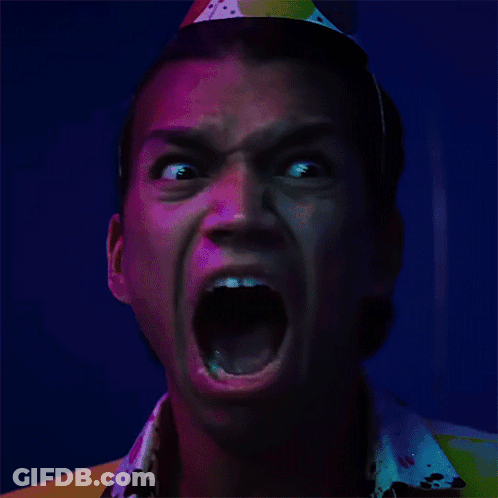 Man Wearing Party Hat With Open Mouth GIF