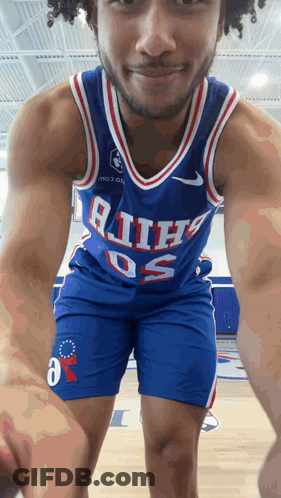 Man Wearing Philadelphia Jersey GIF