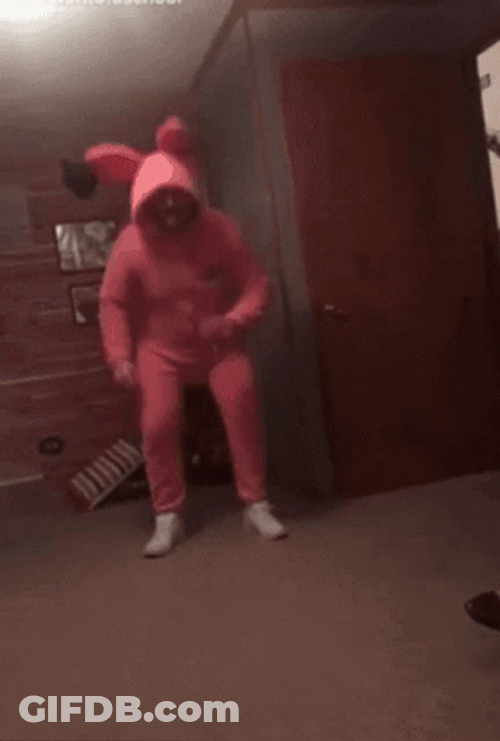 Man Wearing Pink Bunny Costume Hopping GIF