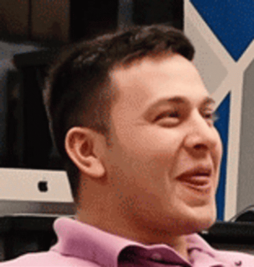 Man Wearing Pink Shirt Laughing Uncontrollably GIF