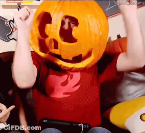 Man Wearing Pumpkin With Letter C On Head GIF
