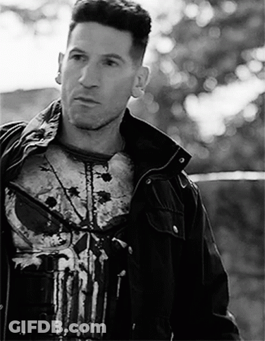 Man Wearing Punisher T-Shirt And Jacket GIF