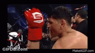 Man Wearing Red Boxing Glove With S GIF