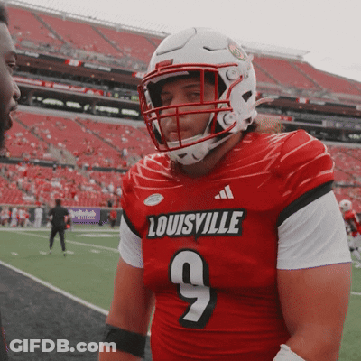 Man Wearing Red Louisville Jersey Number 9 GIF
