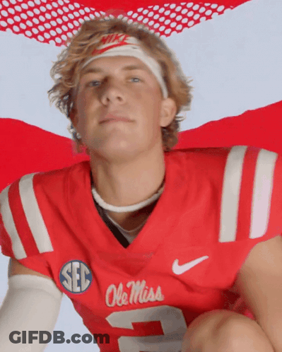 Man Wearing Red Ole Miss Jersey GIF