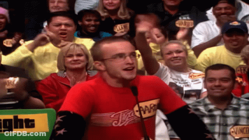 Man Wearing Red Shirt With Vince In Crowd GIF