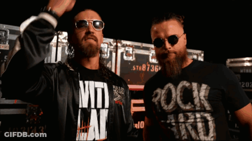 Man Wearing Rock Hard Shirt GIF