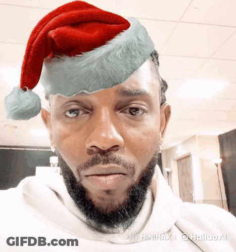 Man Wearing Santa Hat Minimx GIF