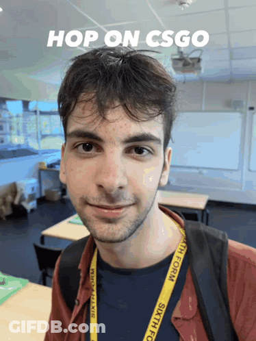 Man Wearing Sixth Form Lanyard Smiling GIF