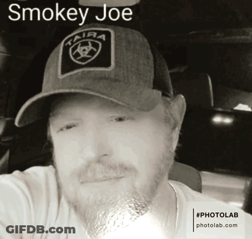 Man Wearing Smokey Joe Hat GIF