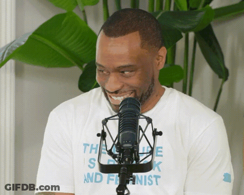 Man Wearing Speak And Feminist T-Shirt GIF