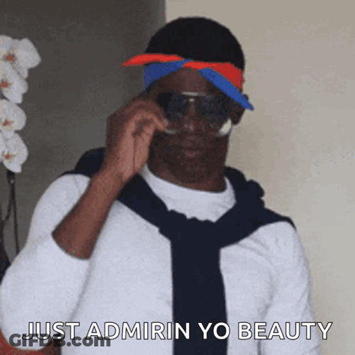 Man Wearing Sunglasses And Bandana Saying Admiring Your Beauty GIF