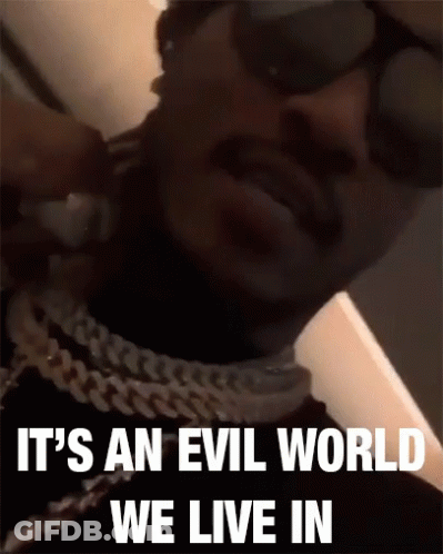 Man Wearing Sunglasses And Chain Says Evil World GIF