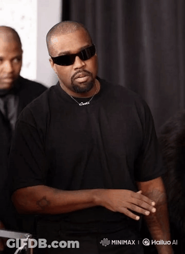 Man Wearing Sunglasses And Chanel Necklace GIF
