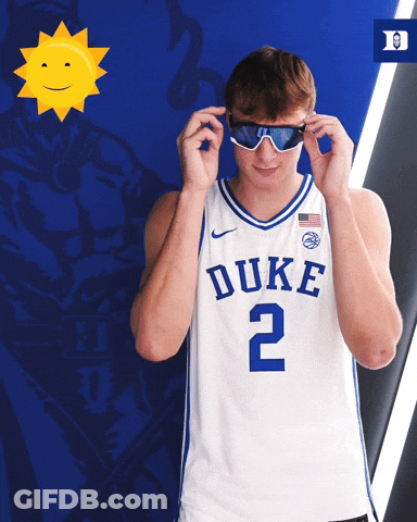 Man Wearing Sunglasses And Duke Jersey Number 2 GIF