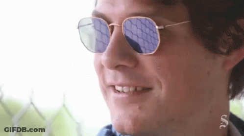 Man Wearing Sunglasses And Earrings GIF