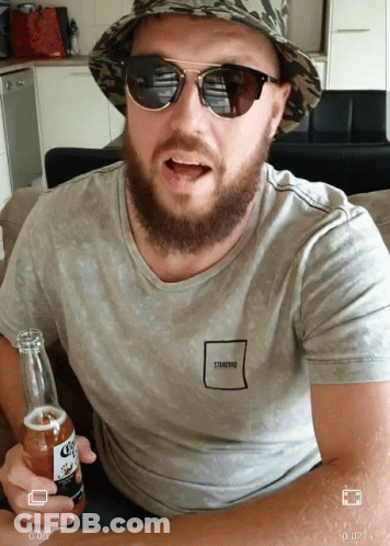 Man Wearing Sunglasses And Hat Holding Corona Beer GIF