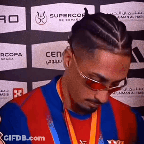 Man Wearing Sunglasses And Medal GIF
