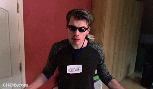 Man Wearing Sunglasses And Name Tag GIF