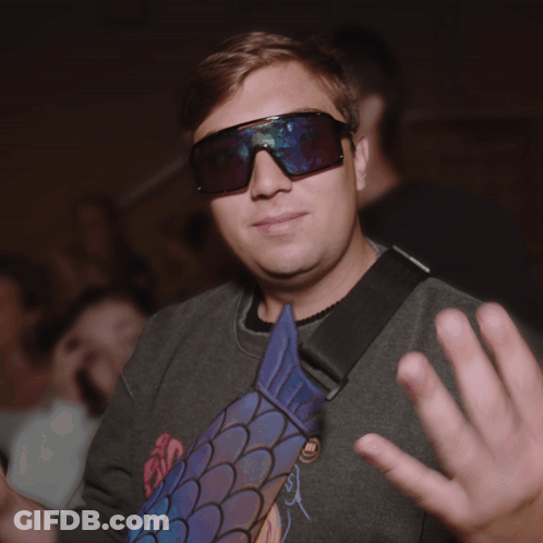 Man Wearing Sunglasses And Shirt With A Sleeve GIF