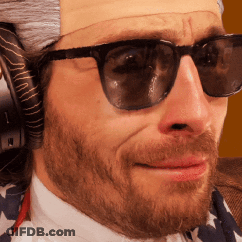 Man Wearing Sunglasses And Wig With H GIF