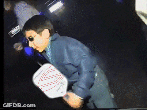 Man Wearing Sunglasses Holding Pro Paddle GIF