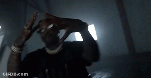Man Wearing Sunglasses In Dark Room GIF